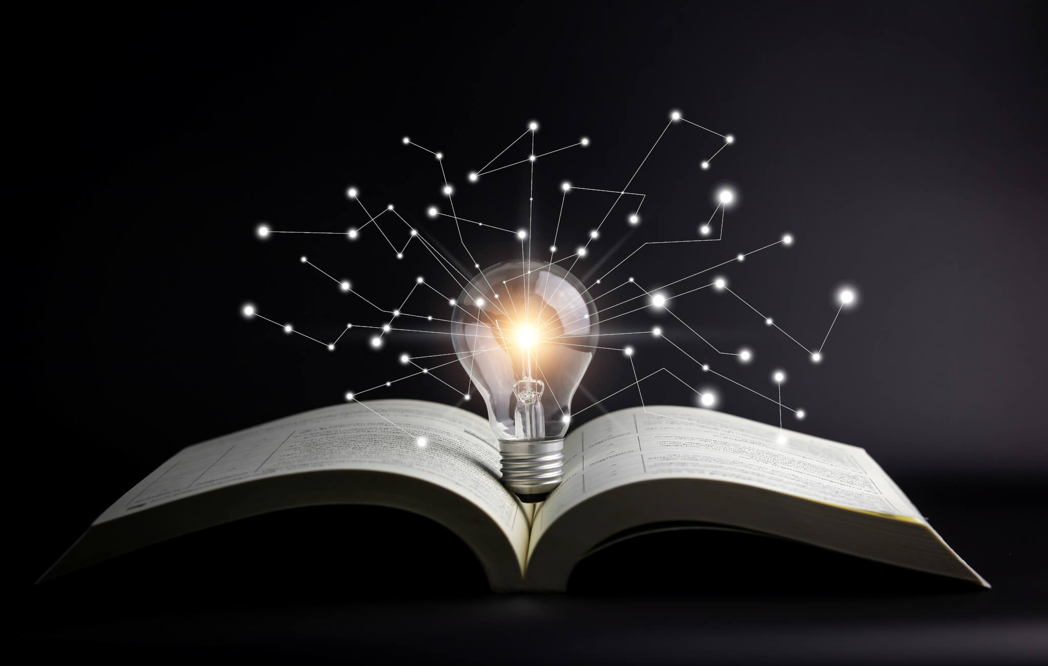 knowledge is power-light bulb on book
